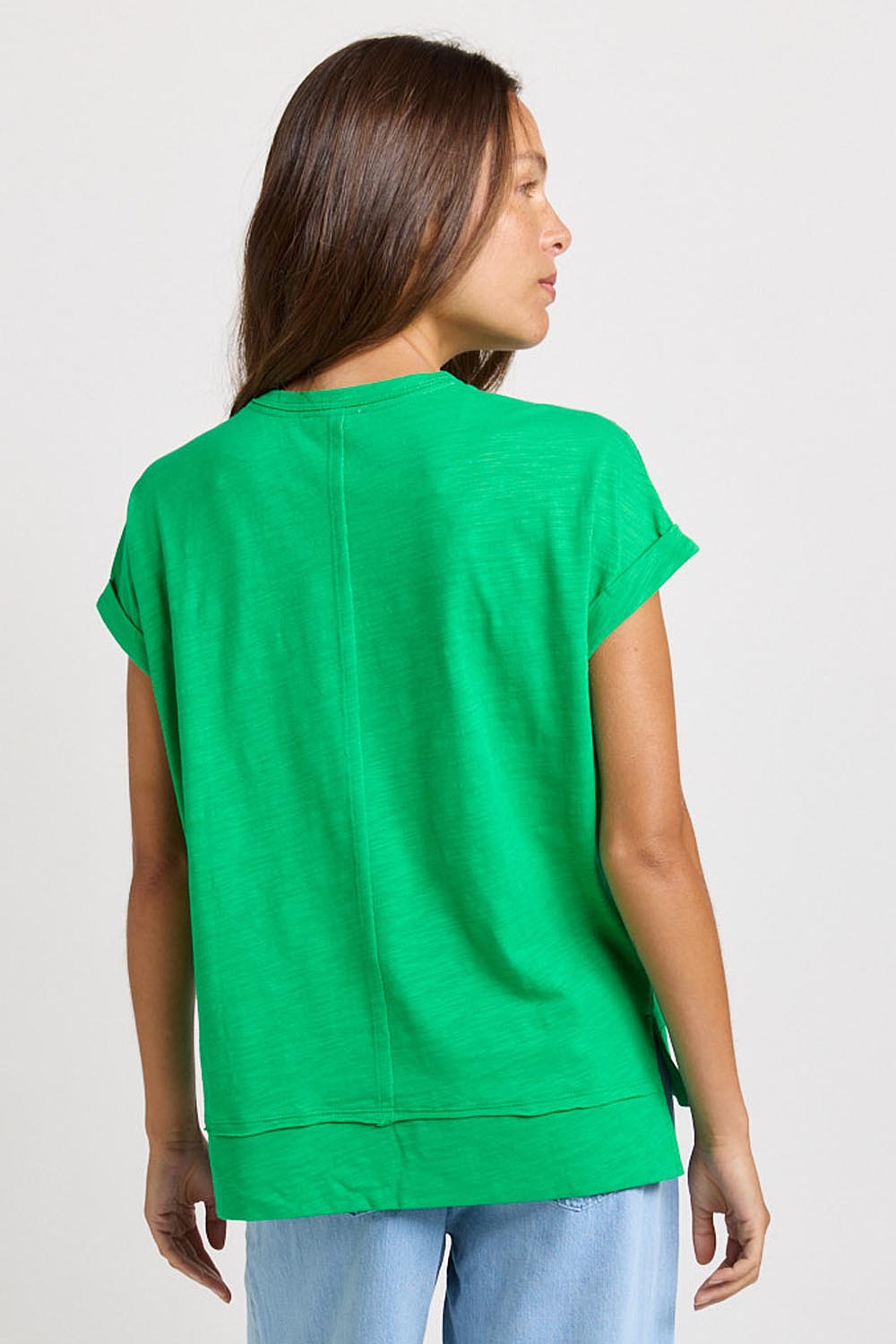Model Genericm wearing size sample of the Shirley Short Sleeve Tee – Green in colour Green, from the back