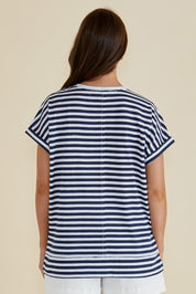 A model wearing the Shirley Cotton Short Sleeve Tee in colour Navystripe (Blue), from the back
