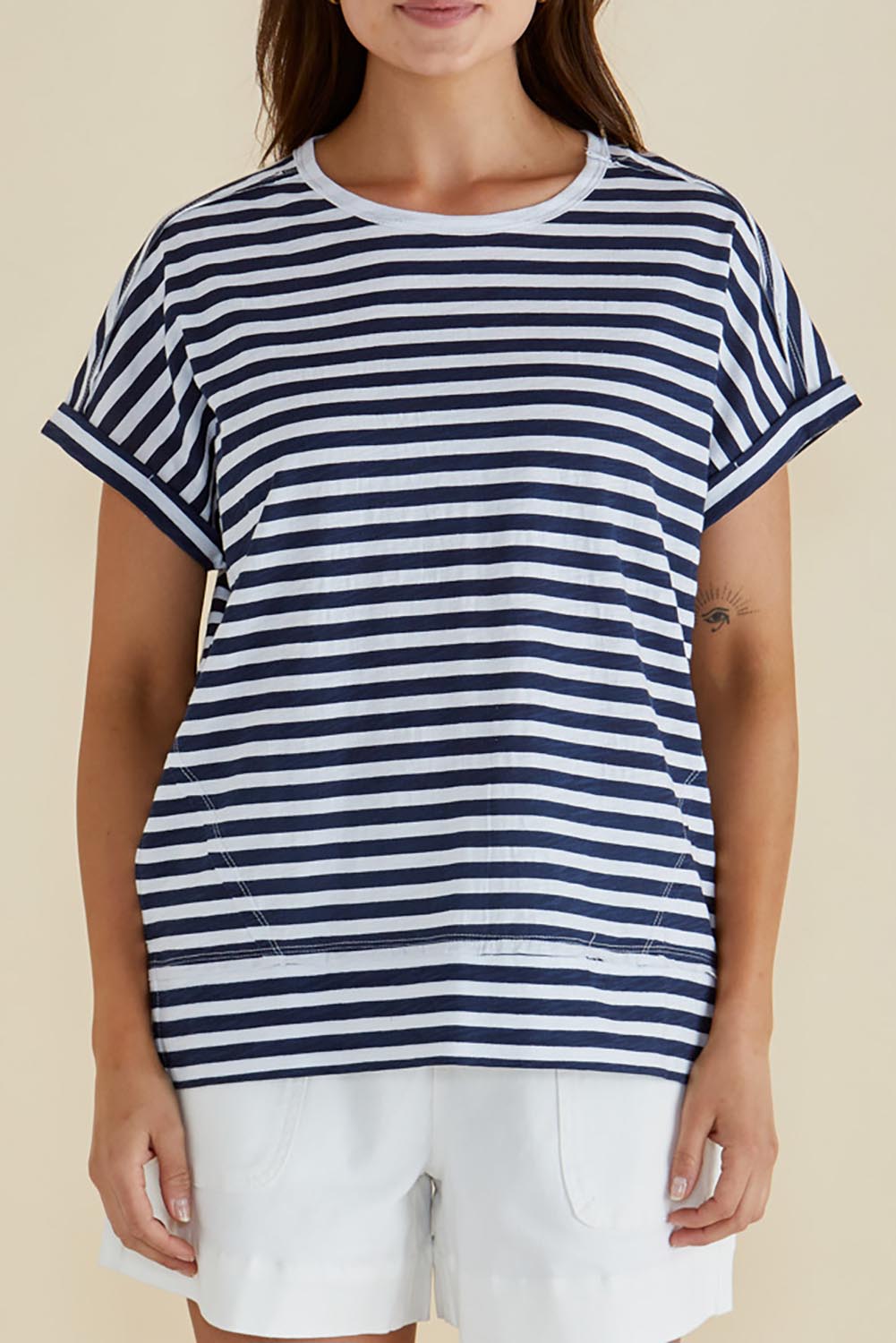 A model wearing the Shirley Cotton Short Sleeve Tee in colour Navystripe (Blue), from the front, cropped image