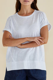 A model wearing the Shirley Cotton Short Sleeve Tee in colour White (White), from the front, cropped image