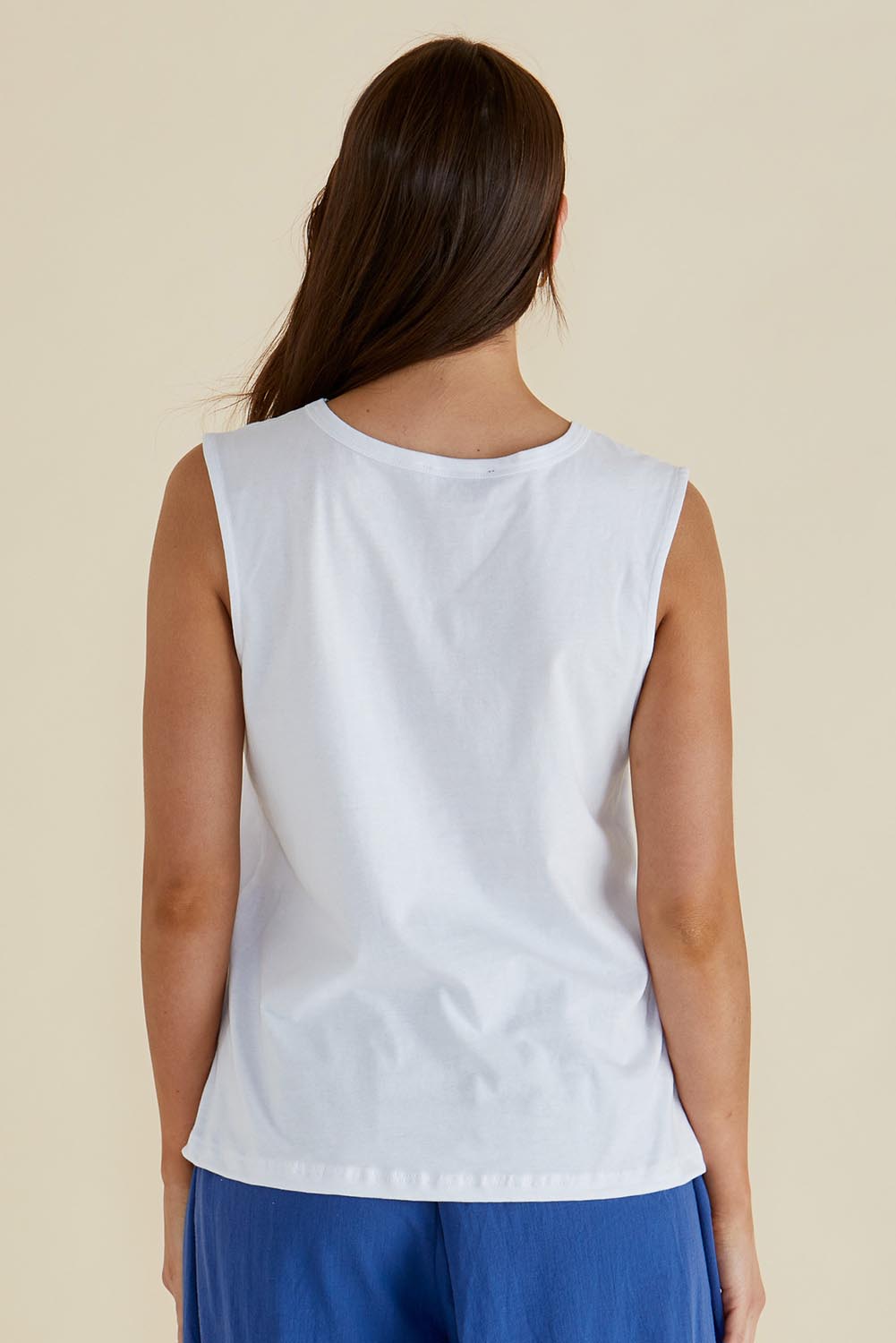 A model wearing the Jordyn Cotton Tank in colour White (White), from the back