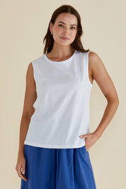 A model wearing the Jordyn Cotton Tank in colour White (White), from the front, cropped image