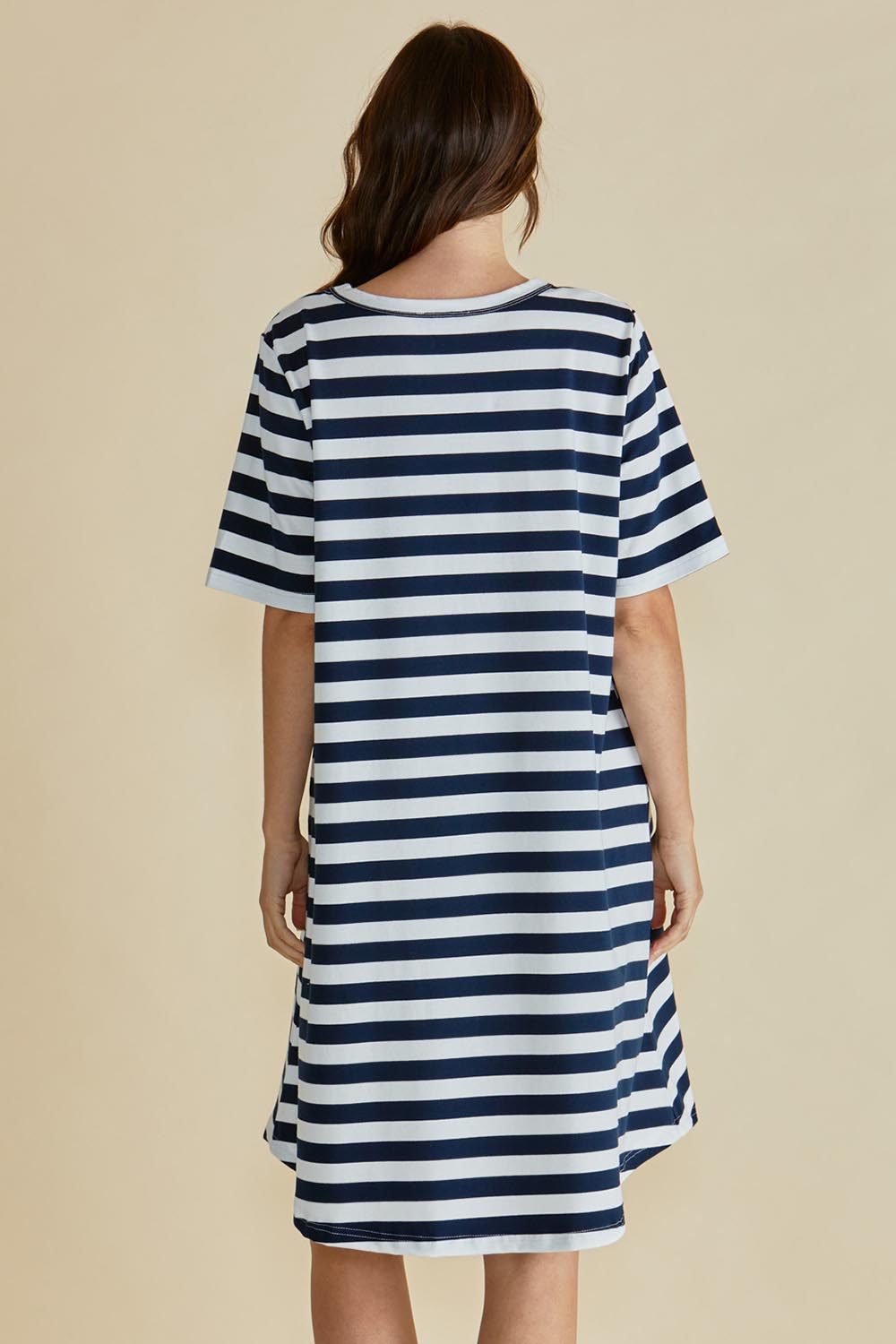 A model wearing the Eloise Cotton Tin colourShirt Dress - Navy (Blue), from the back