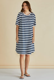 A model wearing the Eloise Cotton Tin colourShirt Dress - Navy (Blue), from the front, showing the whole outfit