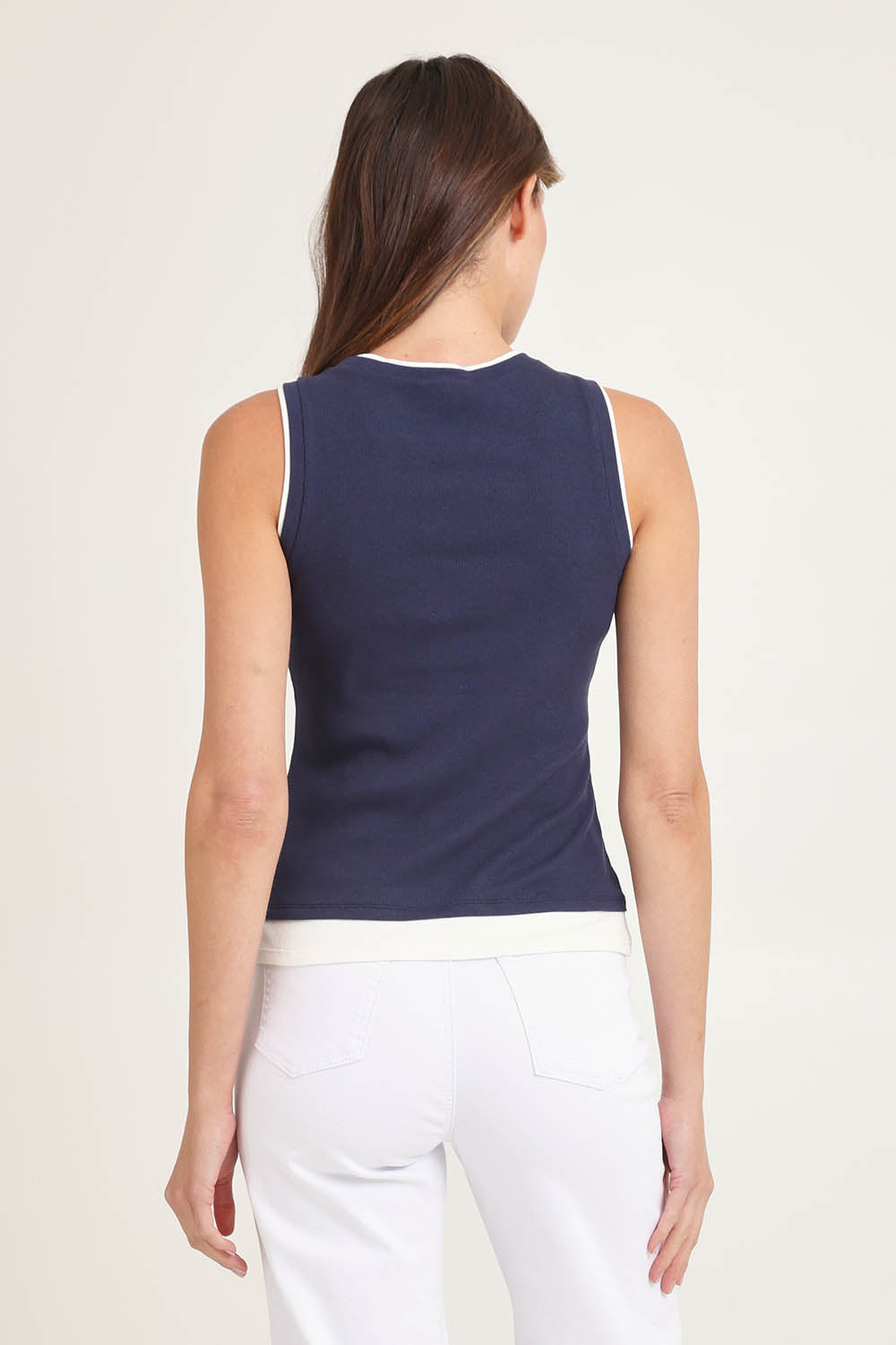 Model Madeline wearing size 10 of Thea Cotton Blend Tank Top in colour Navy (Blue), from the back