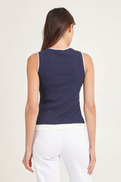 Model Madeline wearing size 10 of Thea Cotton Blend Tank Top in colour Navy (Blue), from the back