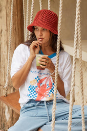 Model Genericm wearing size sample of the V-Neck Boxy Tee – Paradise in colour Paradise, in a cropped view