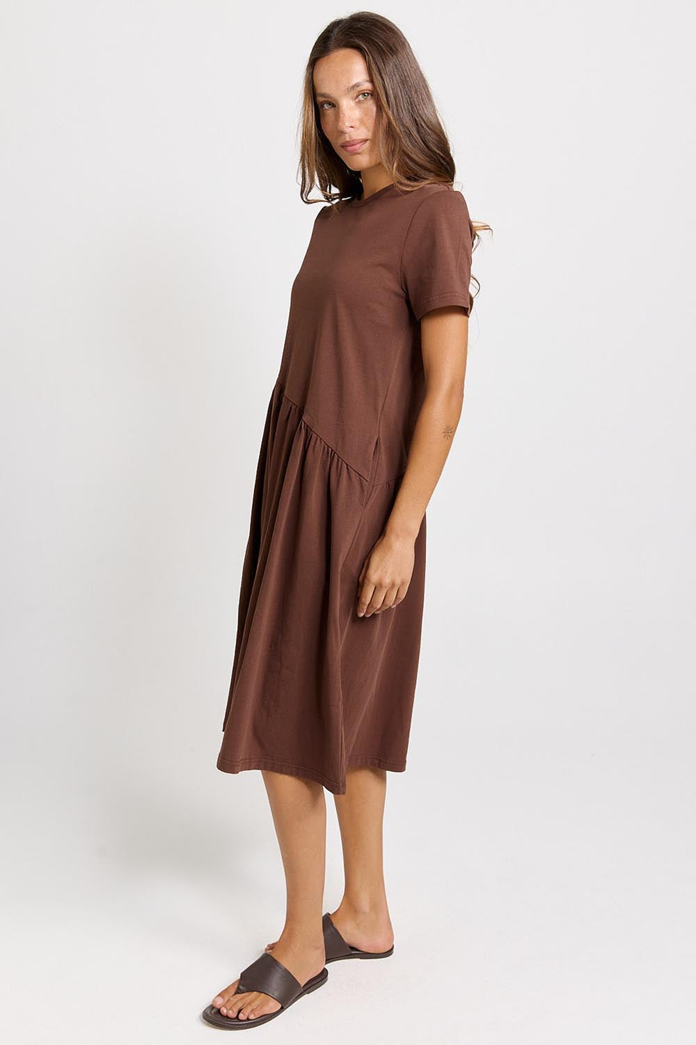 Model Genericm wearing size sample of the Ava Asymmetrical Dress – Chocolate in colour Chocolate, from the front