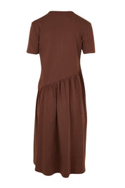 Product shot of the Ava Asymmetrical Dress – Chocolate in colour Chocolate, from the back