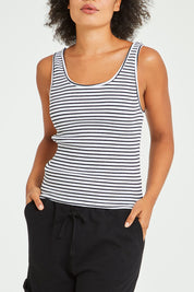 Model Olivia wearing size 10 of the Mimi Rib Tank in colour Whiteblack (White), from the front, cropped image