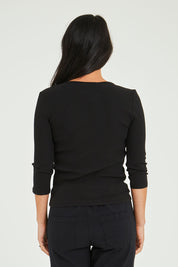 Model Katie wearing size 10 of the Rosa 3/4 Rib Top in colour Black (Black), from the back
