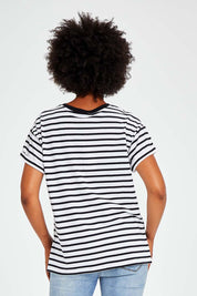 Model Olivia wearing size 10 of the Leighton Tee in colour Whiteblk (Black), from the back