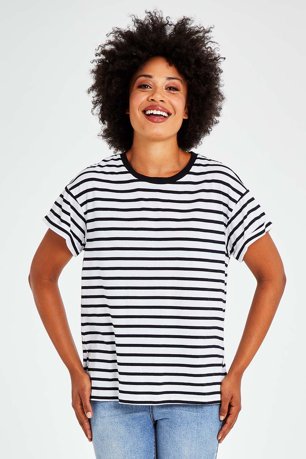 Model Olivia wearing size 10 of the Leighton Tee in colour Whiteblk (Black), from the front, cropped image