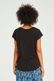 Model Olivia wearing size 10 of the Tyra Top in colour Black (Black), from the back