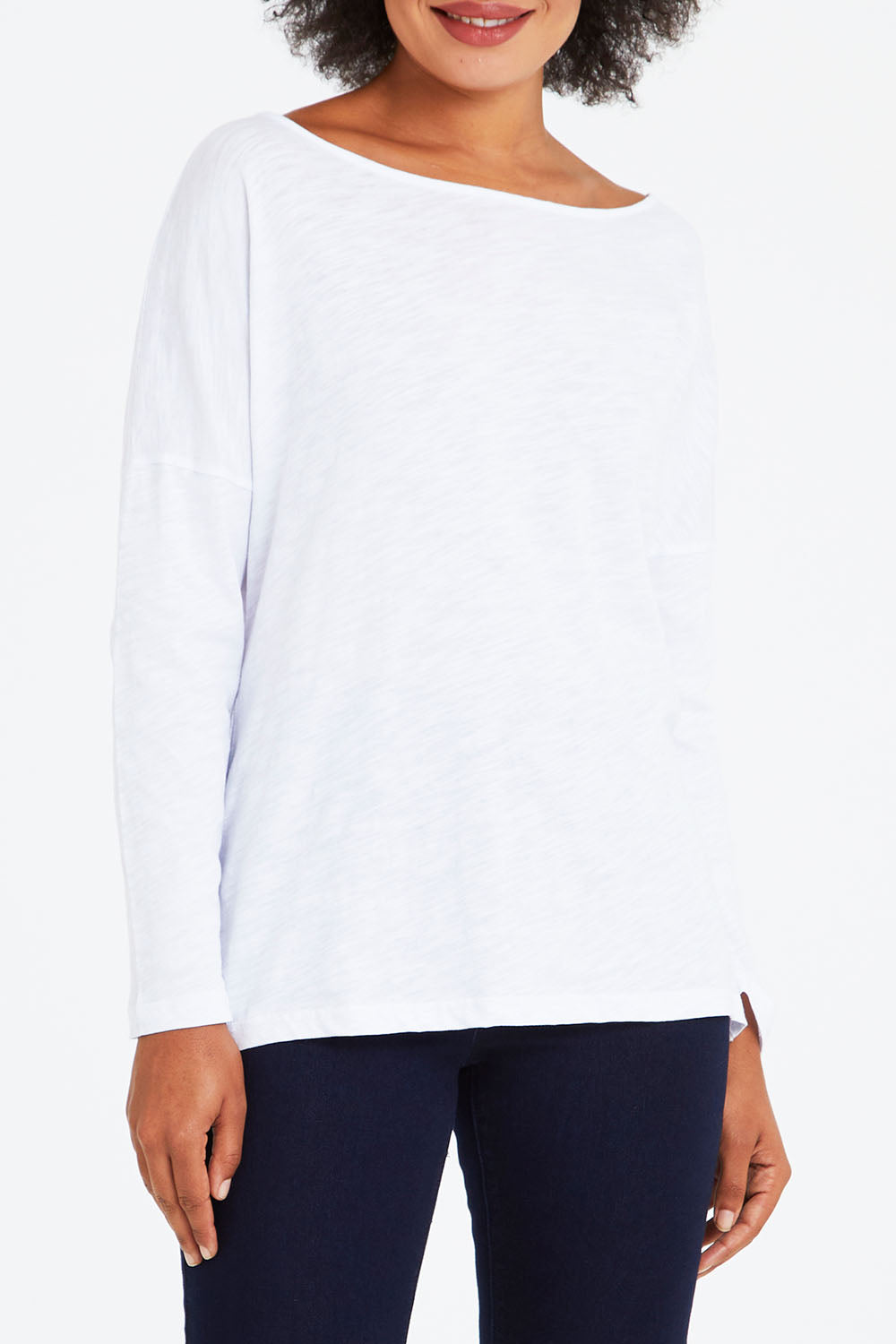 Model Olivia wearing size 10 of the Monique Top in colour White (White), from the front, cropped image