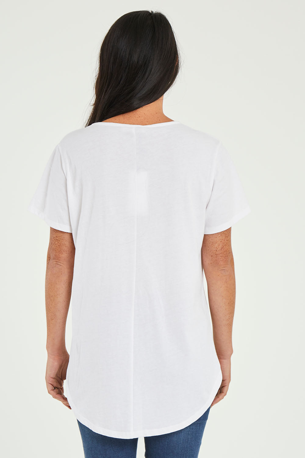 Model Katie wearing size 10 of the Ava Tee in colour White (White), from the back