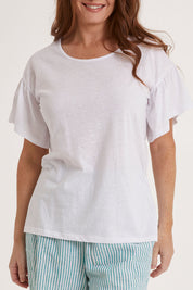 Model Sally wearing size 10 of the Alessi Frill Top in colour White (White), from the front, cropped image