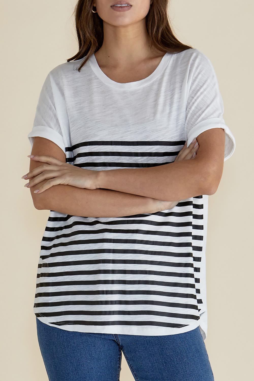 A model wearing the Hailey Short Sleeve Cotton Tee in colour Blkstripe (White), from the front, cropped image
