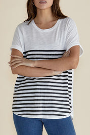A model wearing the Hailey Short Sleeve Cotton Tee in colour Blkstripe (White), from the front, cropped image