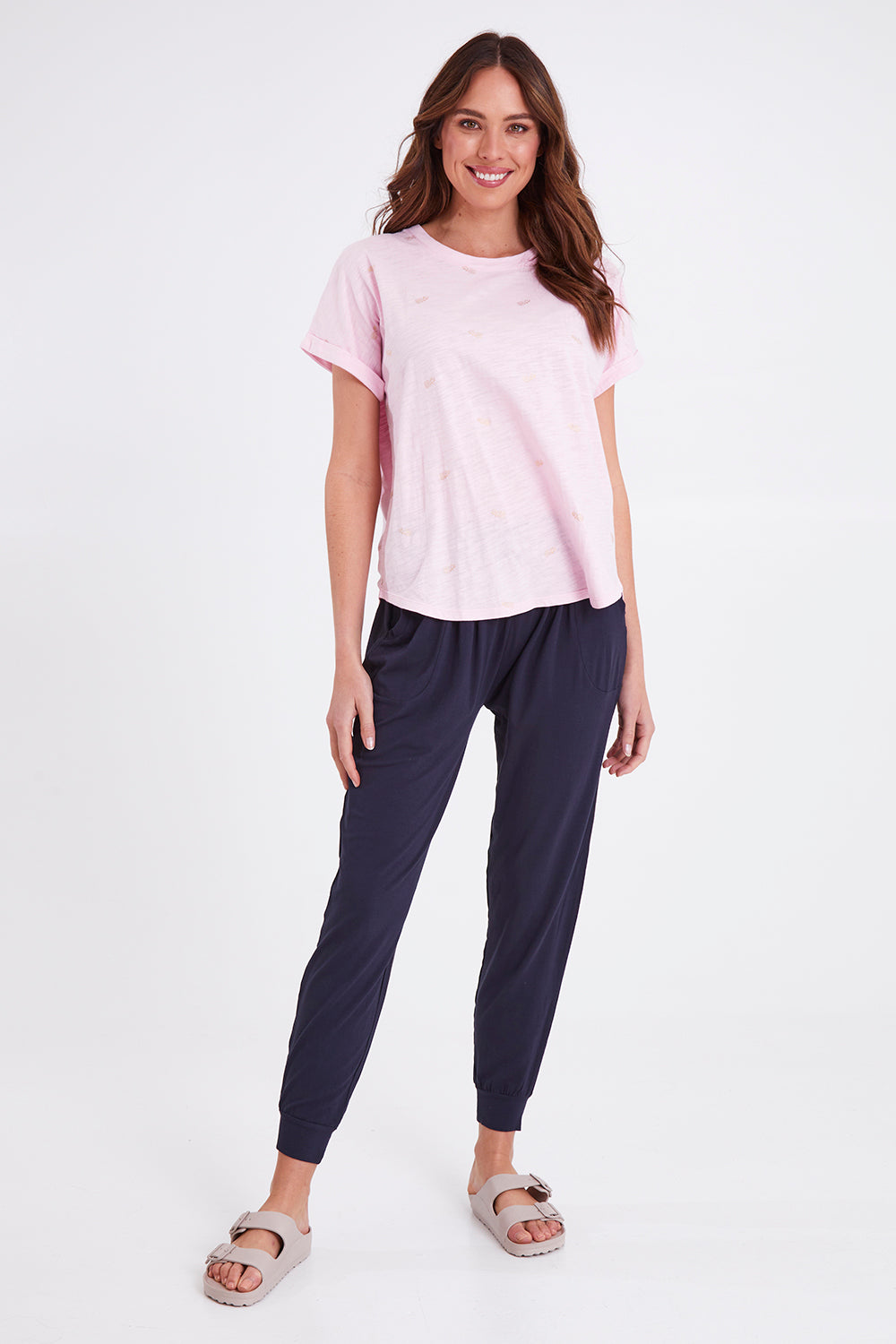 Model Madeline wearing size 10 of the Hailey Short Sleeve Tee in colour Candypine (Pink), from the front, showing the whole outfit