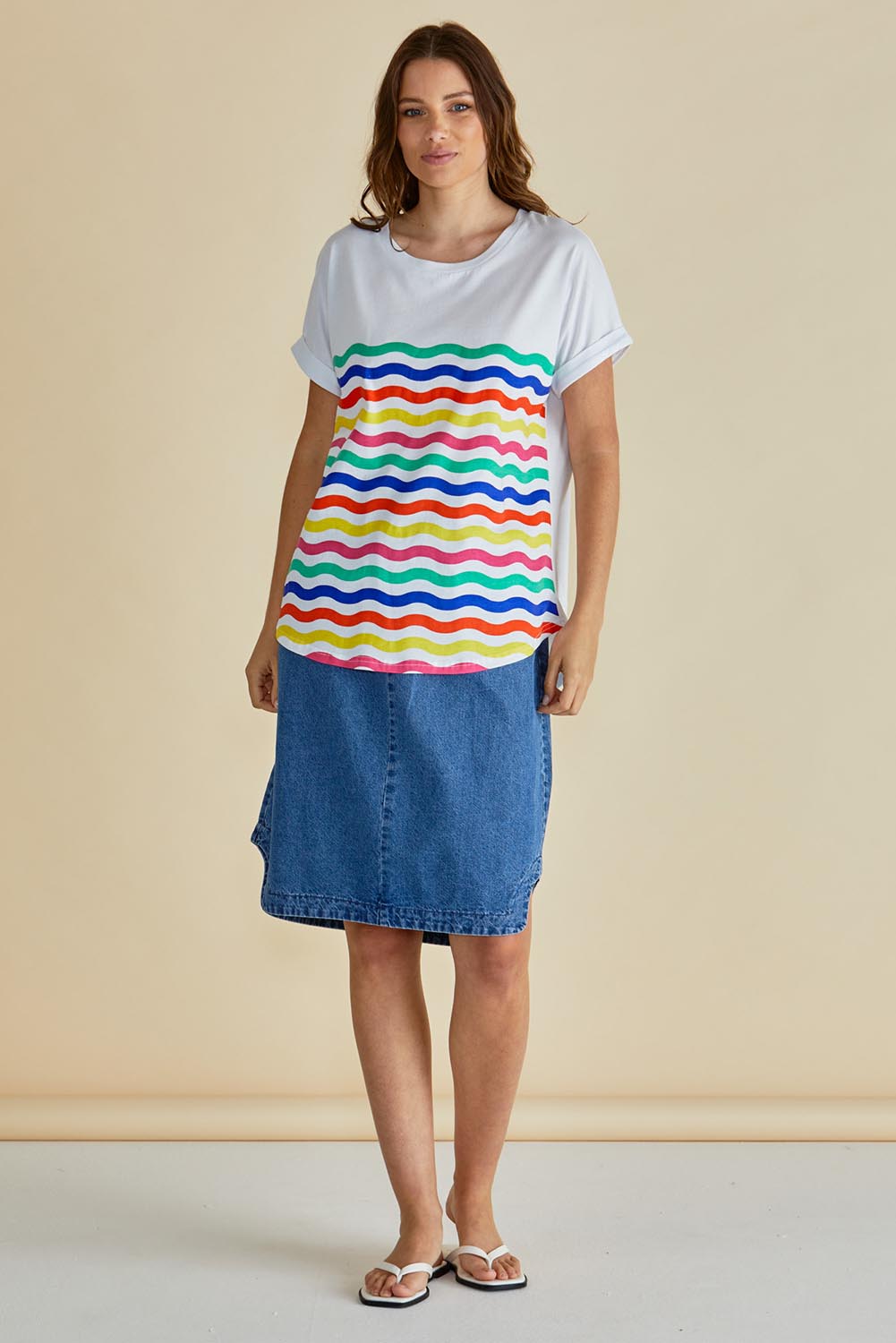 A model wearing the Hailey Short Sleeve Cotton Tee in colour Rainbow, from the front, showing the whole outfit
