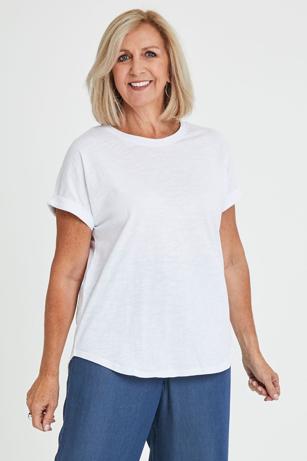 Model Sandy wearing size 10 of the Hailey Short Sleeve Cotton Tee in colour White (White), from the front, cropped image