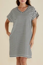 A model wearing the Elise V Neck Cotton Rib Dress in colour Whiteblk, from the front, cropped image