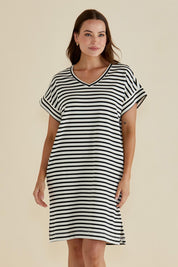 A model wearing the Elise V Neck Cotton Rib Dress in colour Whiteblk, from the front, cropped image