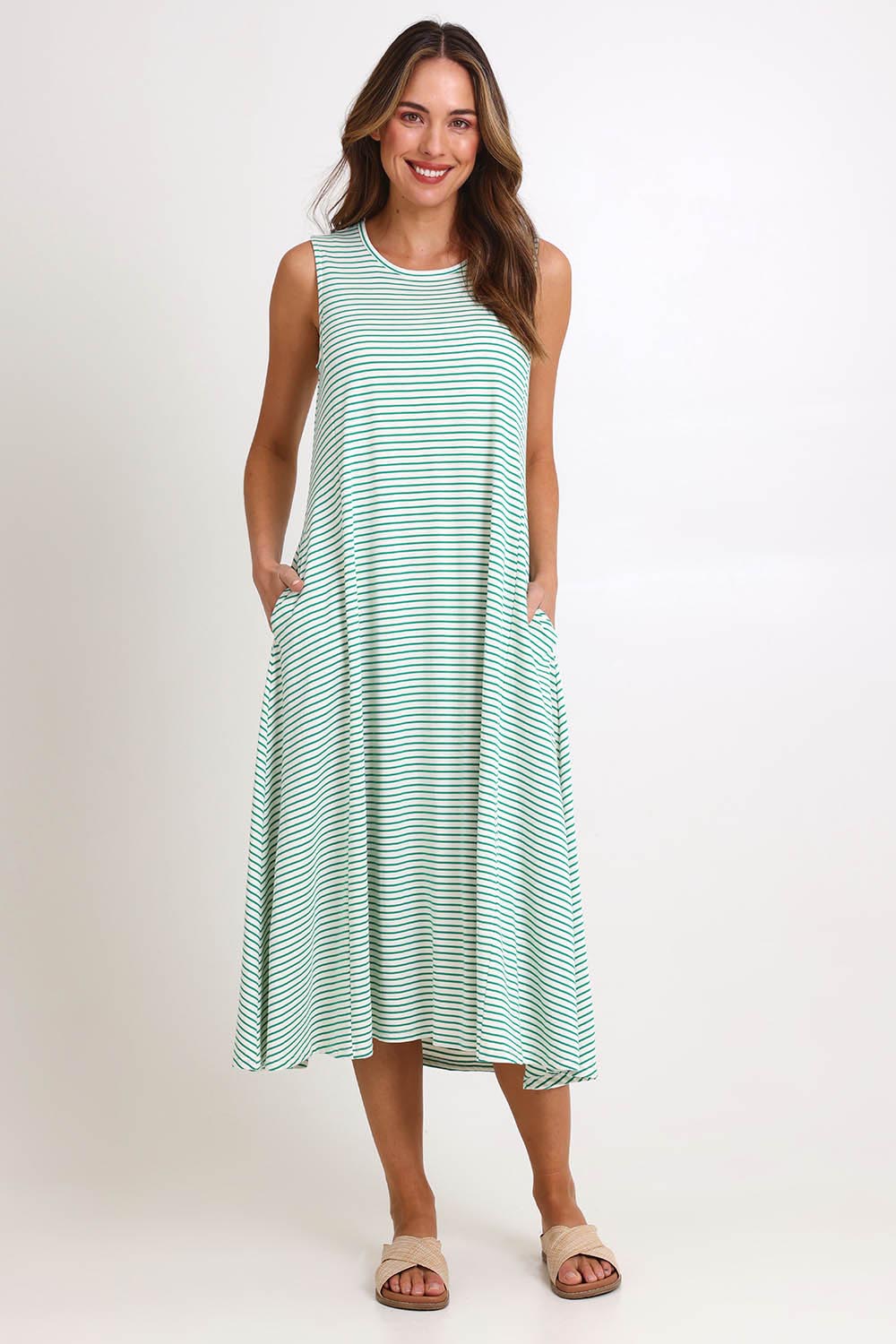 Model Madelinec wearing size 10 of the Sabrina Maxi Dress – Green in colour Green, from the front