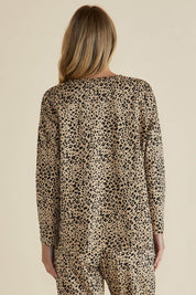 A model wearing the Brixley Long Sleeve Cotton Top in colour Leopard, from the back