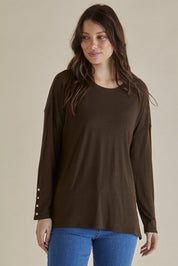 A model wearing the Hendrix Ribbed Long Sleeve Tee in colour Brown, from the front, cropped image