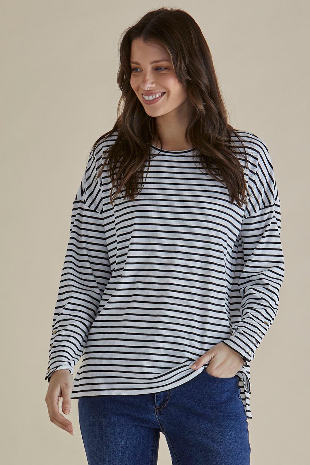 A model wearing the Hendrix Ribbed Long Sleeve Tee in colour Stripe (White), from the front, cropped image