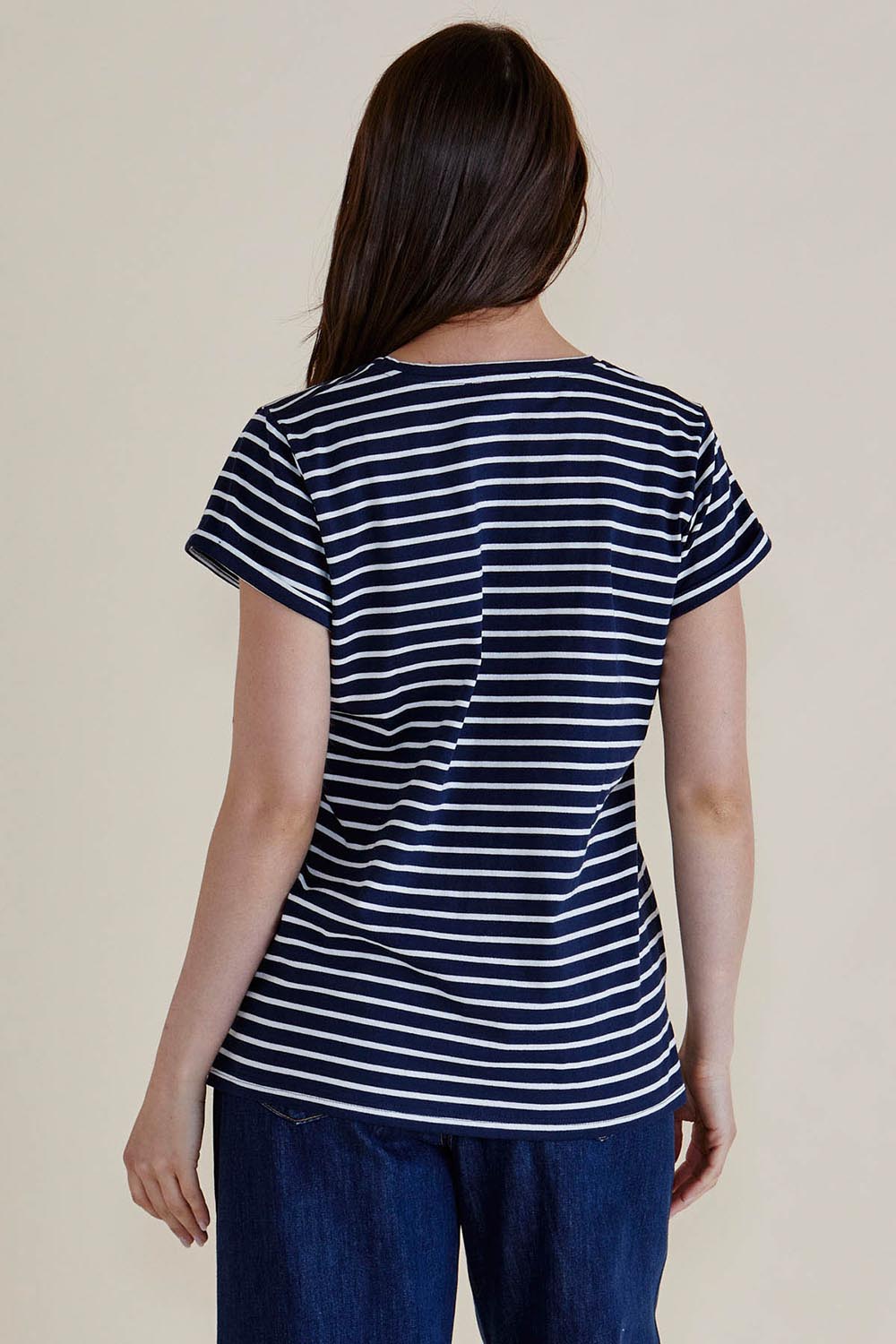 A model wearing the Ayla Vin colourNeck Cotton Tee - Navystripe (Blue), from the back