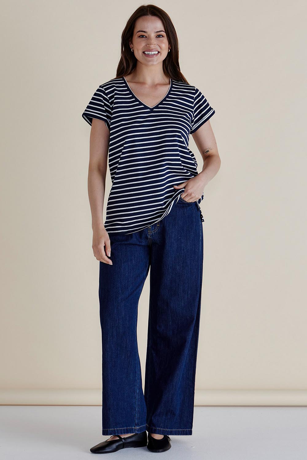 A model wearing the Ayla Vin colourNeck Cotton Tee - Navystripe (Blue), from the front, showing the whole outfit