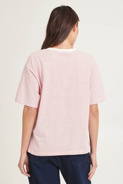 Model Madeline wearing size 10 of the Relax Boxy Cotton Tee in colour Boston (Red), from the back