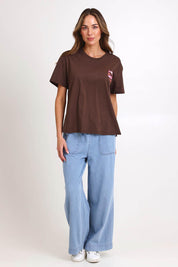 Model Madelinec wearing size 10 of the Relax Boxy Tee – Pescado in colour Pescado, from the front
