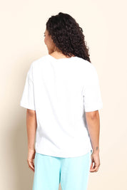 Model Pamelar wearing size 10 of the Relax Boxy Cotton Tee - White in colour White, from the back