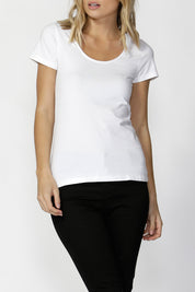 A model wearing the Brittany Tee in colour White (White), from the front, cropped image