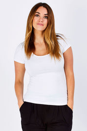 Model Laura wearing size 12 of the Brittany Tee in colour White (White), from the front, cropped image