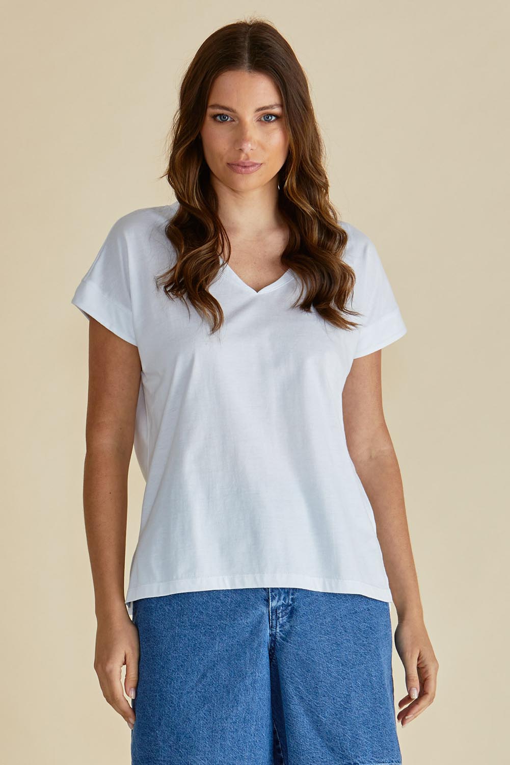 A model wearing the Tracy Vin colourNeck Cotton Tee - White (White), from the front, cropped image