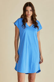A model wearing the Daphne Vin colourNeck Cotton Dress - Powderblue (Blue), from the front, cropped image
