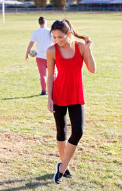 A model wearing the Beyonce 3/4 Leggings in colour Black (Black), from the front, showing the whole outfit