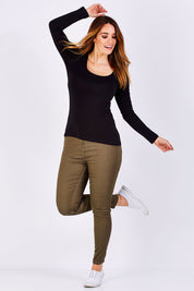 Model Stefania wearing size 12 of the Madonna L/S Scoop Top in colour Black (Black), from the front, showing the whole outfit