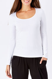 Model Anna wearing size 10 of the Madonna L/S Scoop Top in colour White (White), from the front, cropped image