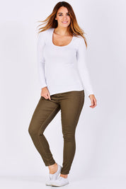 Model Laura wearing size 12 of the Madonna L/S Scoop Top in colour White (White), from the front, showing the whole outfit