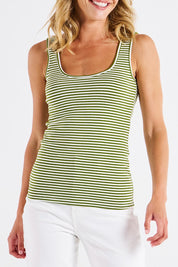 A model wearing the Emma Cotton Scoop Tank in colour Avocadostr (Green), from the front, cropped image