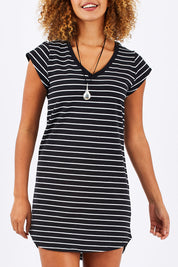 Model Summer wearing size 10 of the Ava Dress in colour BlackWhite (Black), from the front, cropped image