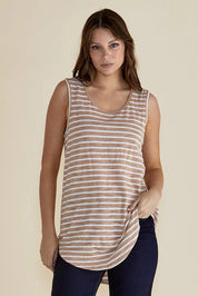 A model wearing the Keira Tank in colour Beigestrip, from the front, cropped image