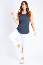 Model Laura wearing size 12 of the Keira Tank in colour Indiblue (Blue), from the front, showing the whole outfit