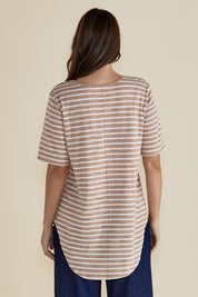 A model wearing the Ariana Cotton Tee in colour Beigestrip, from the back